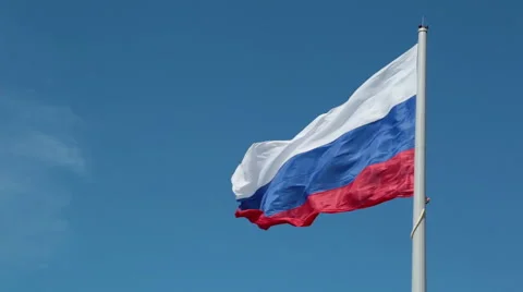Russian flag on the flagpole on blue sky background Stock Footage 51494851
