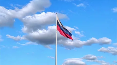 The Russian flag flutters in the wind against the blue sky. Stock Footage 278797199