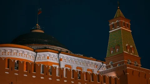 Russian flag, Kremlin wall, Kremlin chimes, St Basil Cathedral, panorama evening Stock Footage 102902938
