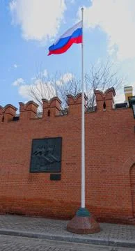 Russian flag at the Kremlin wall 库存照片