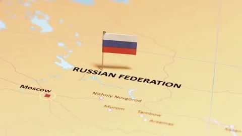 Russian flag on paper map pinned over Moscow and Russian Federation Stock Footage 333485123