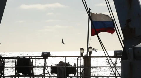 Russian flag in the wind on a ship on the background of the sea Stock Footage 42902586