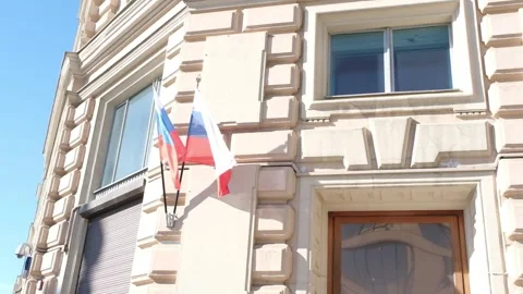 Russian flags fly on the building. 스톡 동영상 299685813