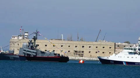 The Russian fleet in the background of the old port fortress. Sevastopol. Crimea Stock Footage 68927029