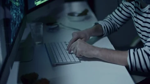 Russian Hacker Hacking Database at Night Stock Footage 85826966