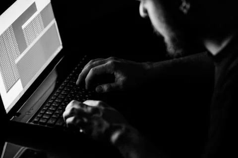 Russian hacker hacking the server in the dark 스톡 사진