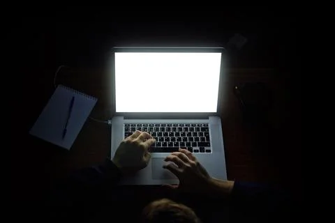 Russian hacker hacking the server in the dark Stock Photos