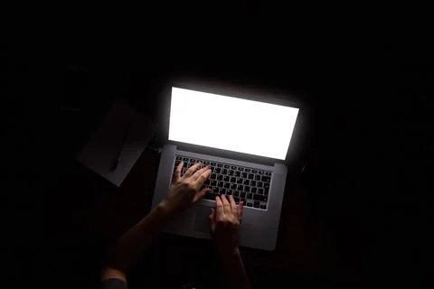 Russian hacker hacking the server in the dark Photos