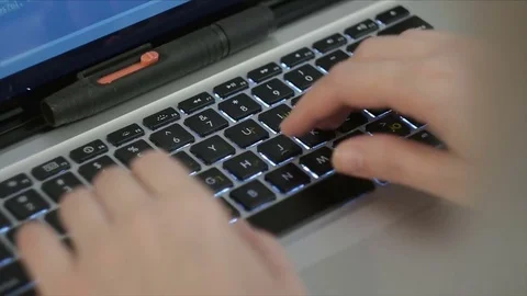 Russian hacker typing on keyboard computer Stock Footage 71367950