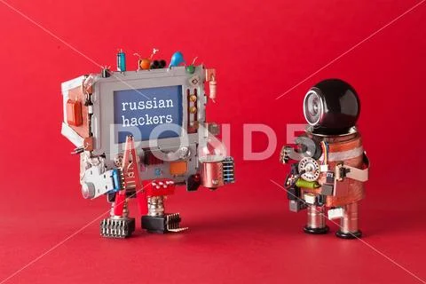 Russian hackers cyber attack concept. System administrator and computer with Stock Photos