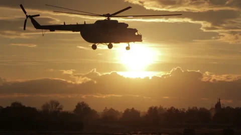 Russian helicopter takes off at sunset Stock Footage 57763863