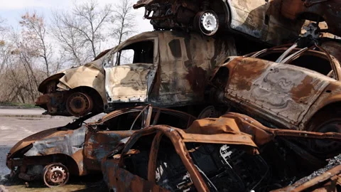Russian invasion, Car devastation, War cemetery Stock Footage 245112970