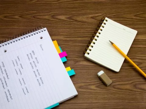 Russian; Learning New Language Writing Words on the Notebook Stock Photos