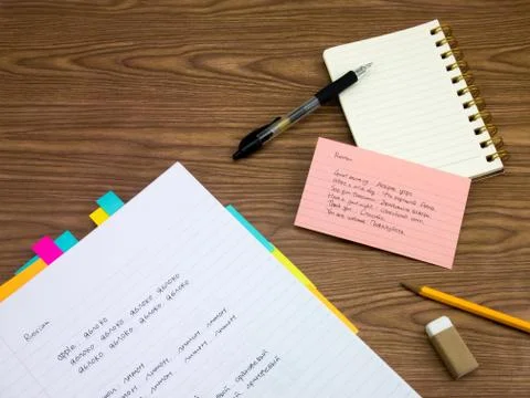 Russian; Learning New Language Writing Words on the Notebook Stock Photos