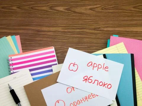 Russian; Learning New Language Writing Words on the Notebook Stock Photos
