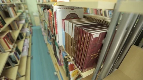 Russian library, bookshelves, right to left m/s Stock Footage 75982840