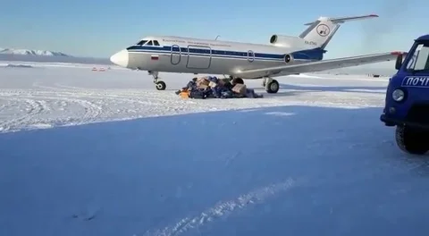 Russian mail plane sends parcels scattering across runway Stock Footage 109259565