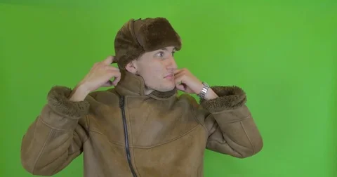 Russian man escapes from the cold, calling a taxi Stock Footage 75910272