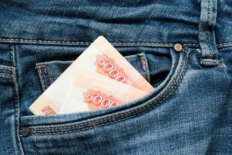 Russian money roubles in blue jeans pocket as a top view image Stock Photos