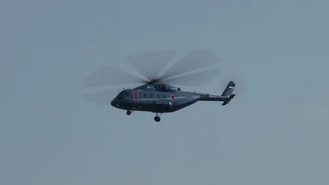 Russian multi-purpose Mi-38 helicopter will perform left turn with climb. Stock Footage 107584304