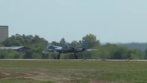Russian multifunctional fighter Su-57 (NATO - Felon) accelerates and takes off. Stock Footage 219812145