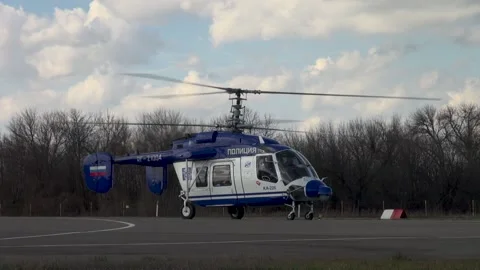 Russian multipurpose helicopter Ka-226 on runway with running engines. Stock Footage 139399896