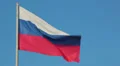Russian national flag waving on flagpole on blue sky background HD Footage