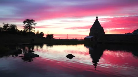 Russian Orthodox Solovetsky Monastery on amazing red sunset. Stock Footage 64929825