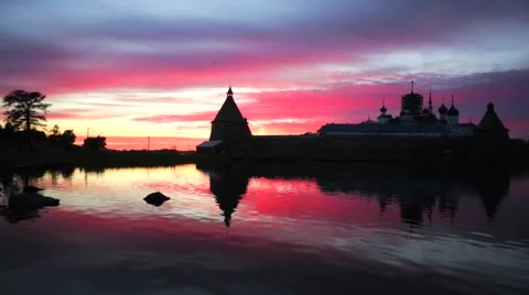 Russian Orthodox Solovetsky Monastery on amazing red sunset. Stock Footage 64929832