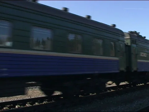 Russian passenger train pass by Stock Footage 650689