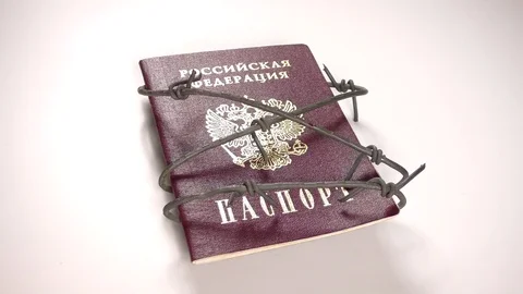 Russian passport bound with barbed wire, concept Stock Footage 83622386
