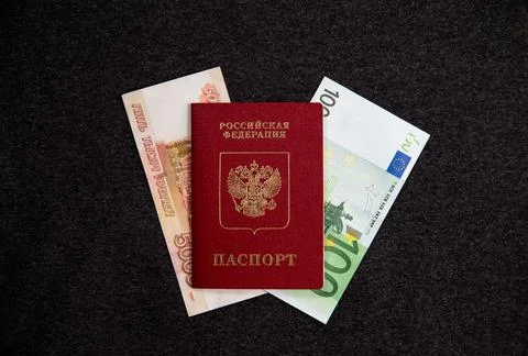 Russian passport, euros, five thousand rubles, flatlay. Currency exchange. Stock Photos