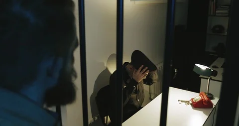 The Russian policeman takes off his cap and lies on the table Stock Footage 88332290