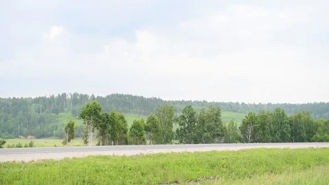 Russian road in the fields Stock Footage 92105756