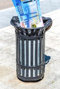 Russian rouble banknote in the garbage bin Stock Photos