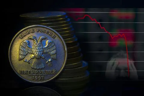 Russian Ruble Coins with falling Stack. Ukrainian flag colors illuminating. U Stock Photos