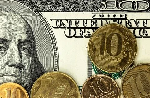 Russian rubles coins and dollars banknotes close up Foto stock
