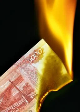Russian rubles on fire Stock Photos