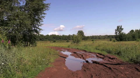 Russian rural landscape with empty countryside dirt wet road Stock Footage 50225699