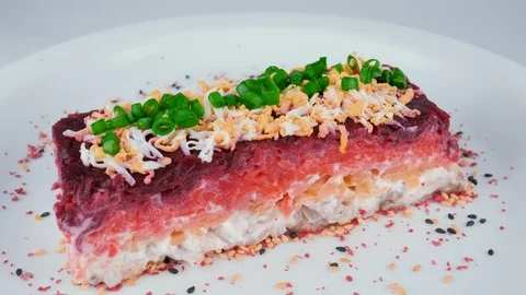 Russian salad, dressed herring under fur coat, pickled herring Stock Footage 94332726