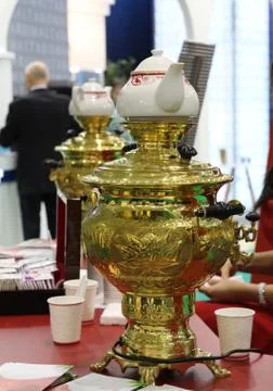 Russian samovar - an old device for tea. The tradition of making tea in a sam Stock Photos