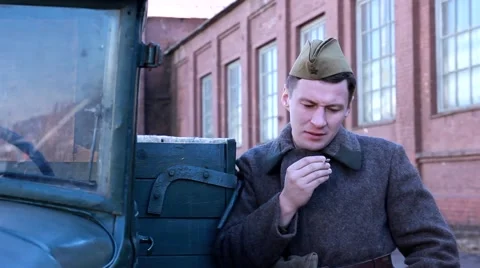 Russian soldier smokes a machine closeup Stock Footage 48042460