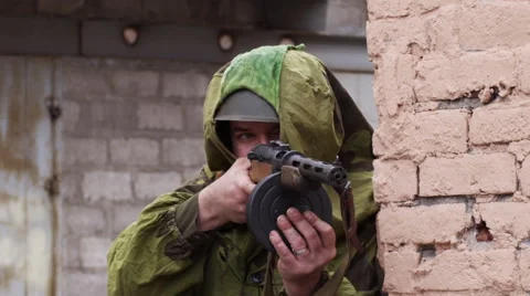 Russian soldier of world war two are shooting from mashine gun in slow motion Stock Footage 61926159