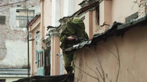 Russian soldier of world war two runs and shoots from mashinegun Stock Footage 61936134