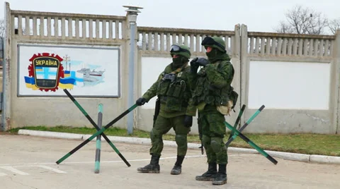 Russian soldiers guarding a naval base in Perevalne, Crimea Stock Footage 35871063