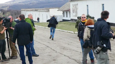 Russian soldiers marching on March 5, 2014 in Perevalne, Crimea Stock Footage 35935393