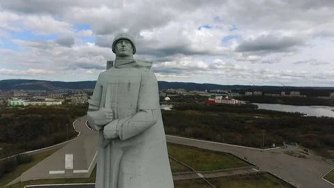 Russian Soviet Soldier Statue Standing on Top of Hill by City. Path Walk on Stock Footage 73928437