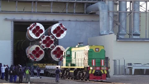 Russian spacecraft Soyuz 2.1a emerging from building at Cosmodrome Kazakhstan Stock Footage 273698111