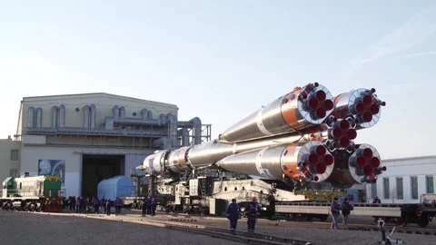Russian spacecraft Soyuz 2.1a rolling out from building at Cosmodrome Kazakhstan Stock Footage 273698012