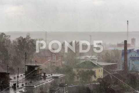 Russian suburbs roofs under heavy rain telephoto shot Stock Photos